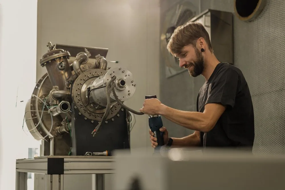 Engineer working on a micro gas turbine